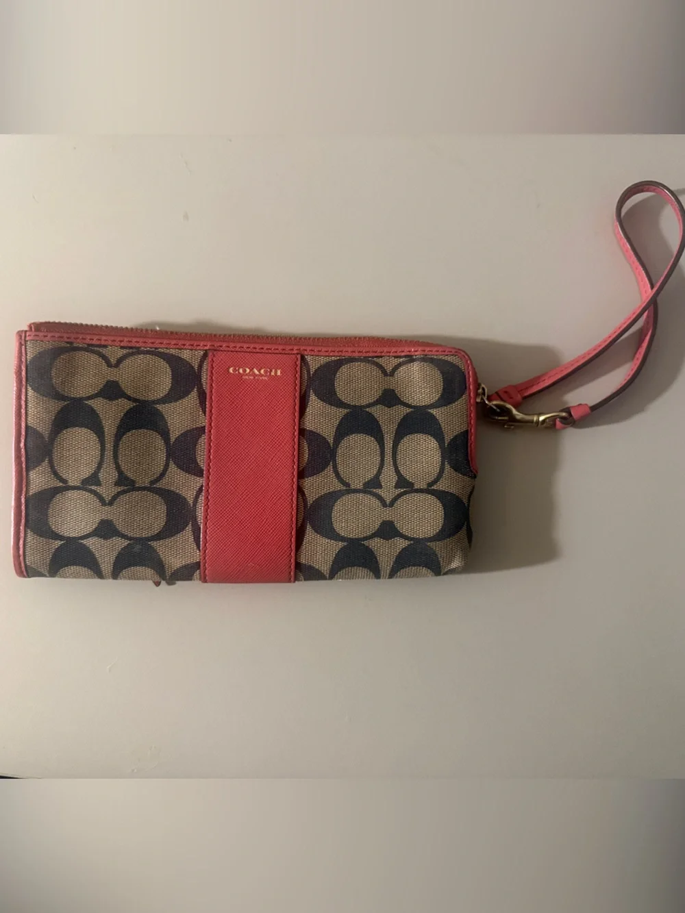 Coach Signature Canvas Wristlet in pink and Tan